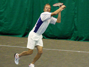Man Playing on Indoor Courts