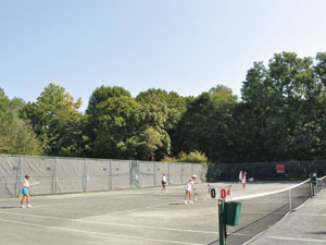 Women Playing on Outdoor Courts