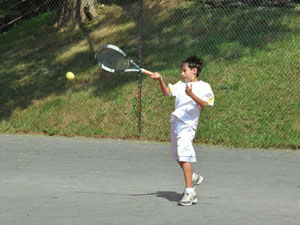 Boy Playing on Outdoor Courts