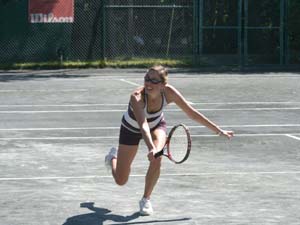 Woman Playing on Outdoor Courts
