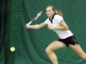 Woman Playing on Indoor Courts