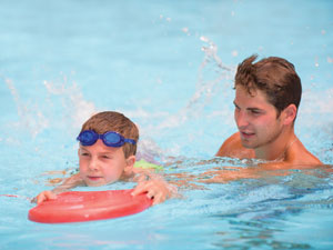 Child Taking Swim Lesson